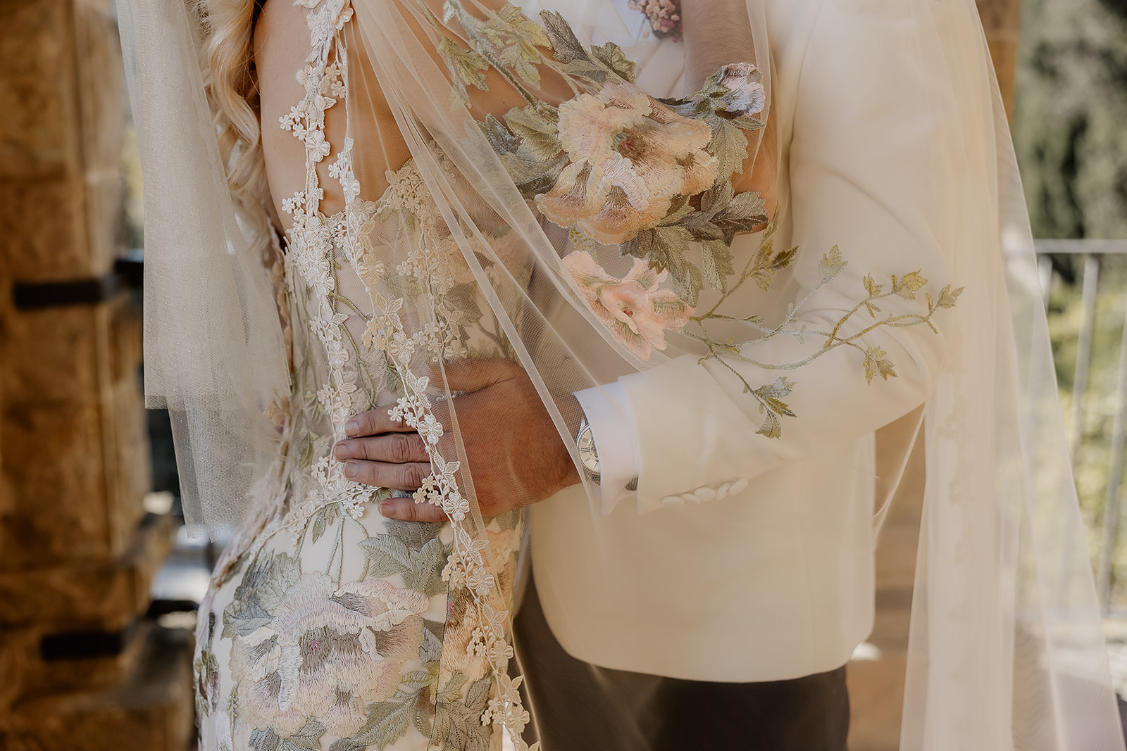 Close-up portrait of the bride and groom embracing during their Barcelona Spain wedding at La Baronia.
