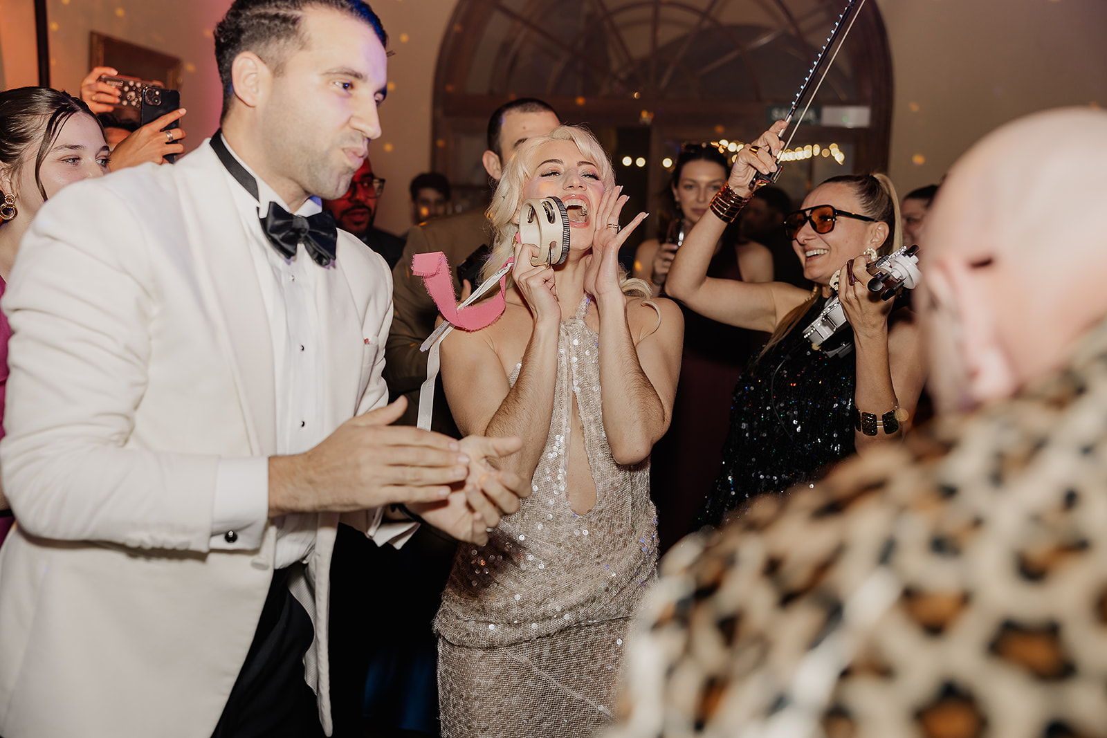 Bride and groom dancing during their live entertainment during their reception.