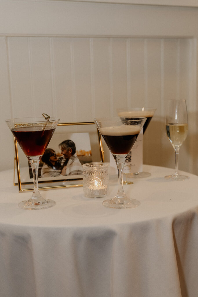 Signature drinks sitting on a table.