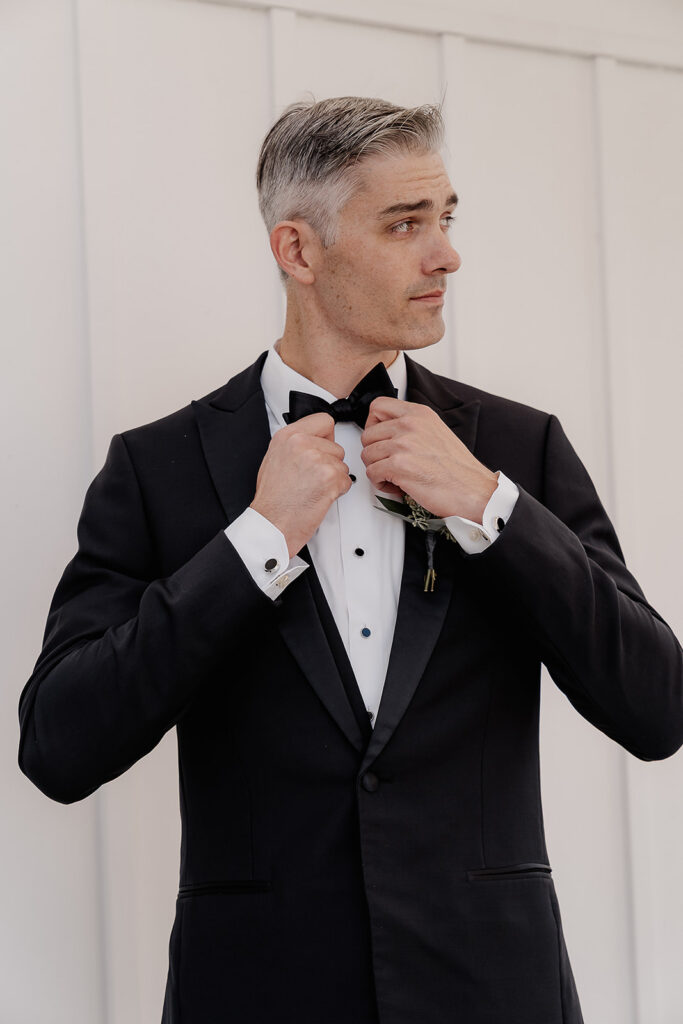 Close up portraits of the groom at Farmhouse wedding venue in Hampton, NJ.