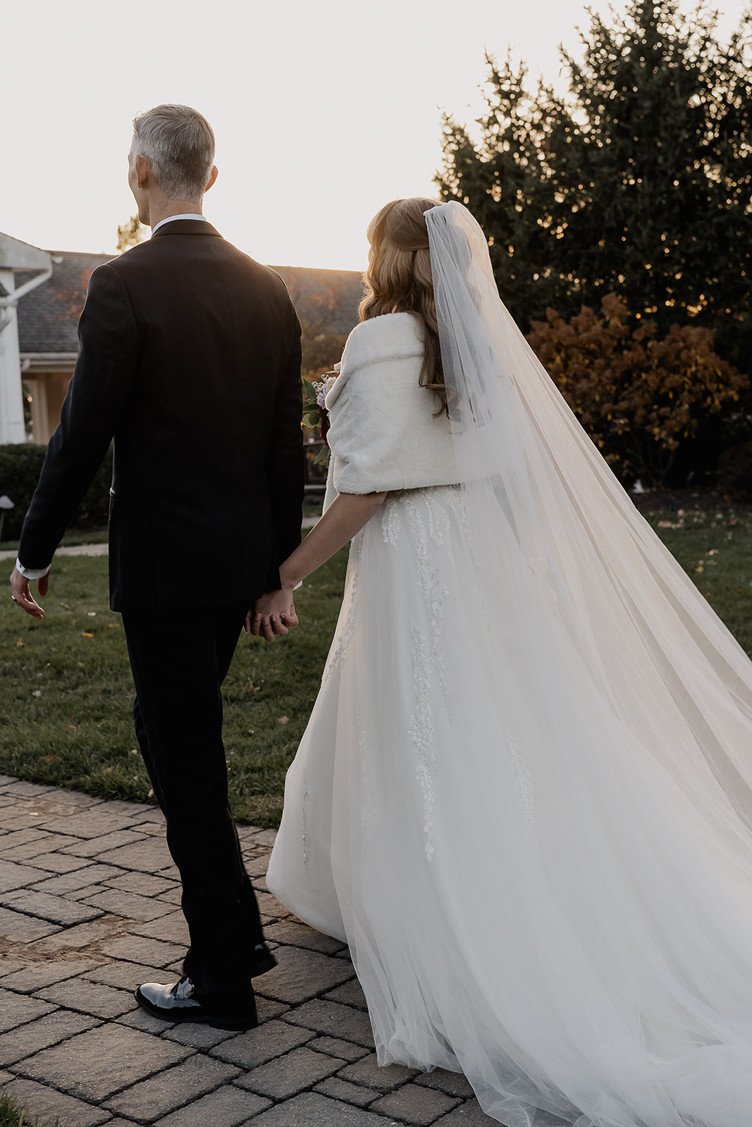 Bride and groom walking back down the aisle as husband and wife after their ceremony.