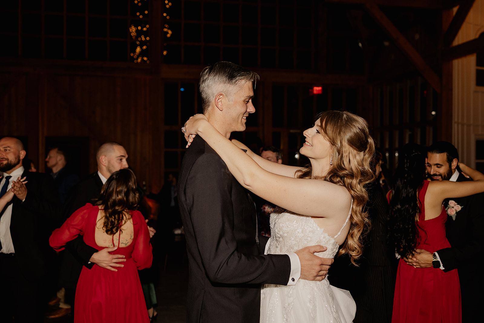 Bride and groom dancing together during reception at The Farmhouse wedding venue in Hampton, NJ.