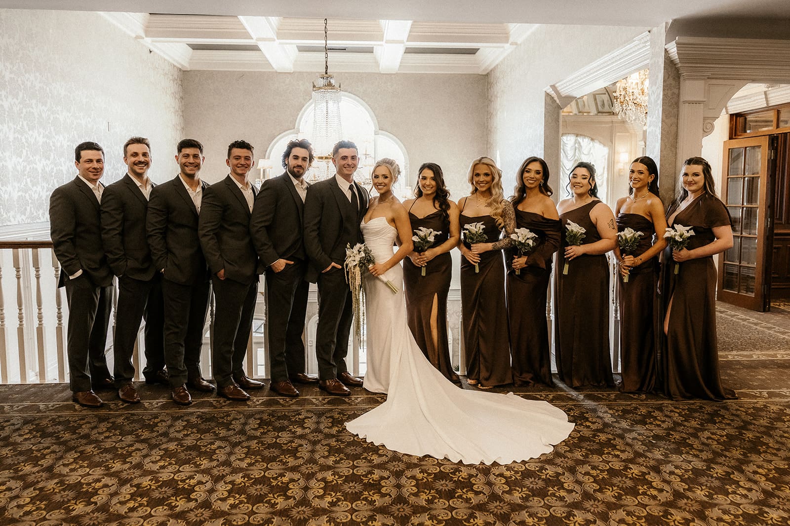 Wedding party posing together inside The Brownstone in Paterson, NJ.