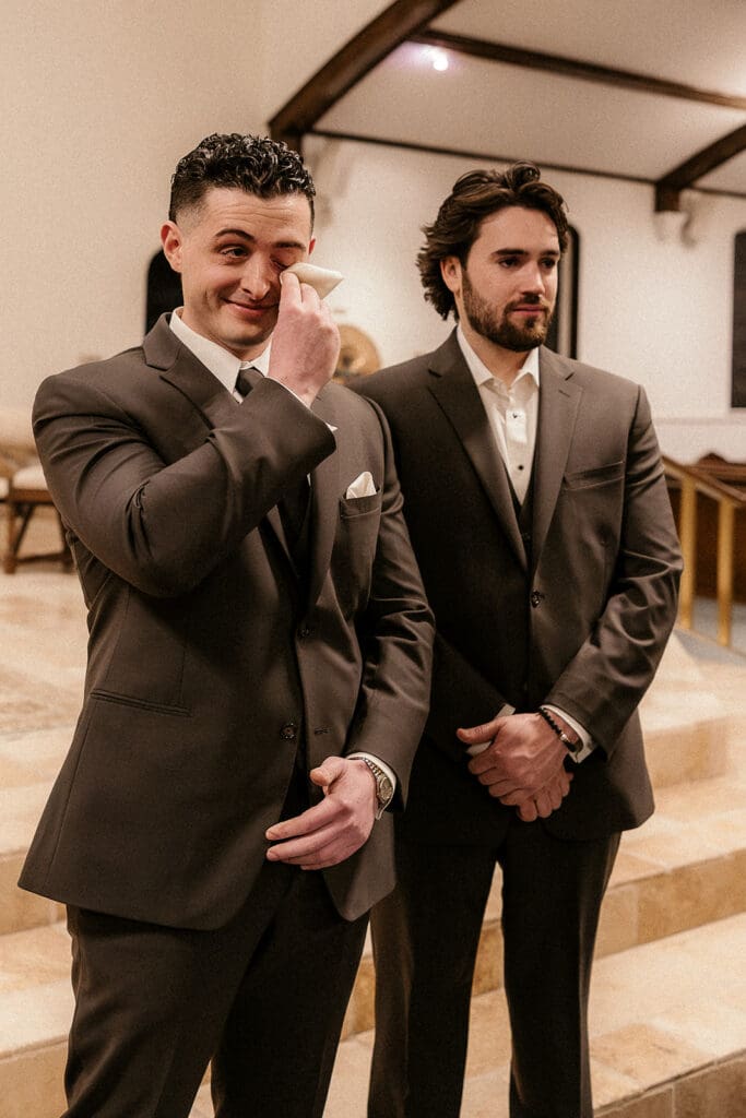 Groom getting emotional during his Catholic wedding ceremony at St. Mary’s Church in Pompton Lakes, NJ.