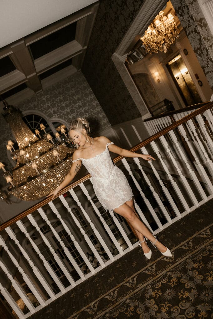 Bride wearing a second wedding dress on the balcony at The Brownstone in Paterson, NJ.