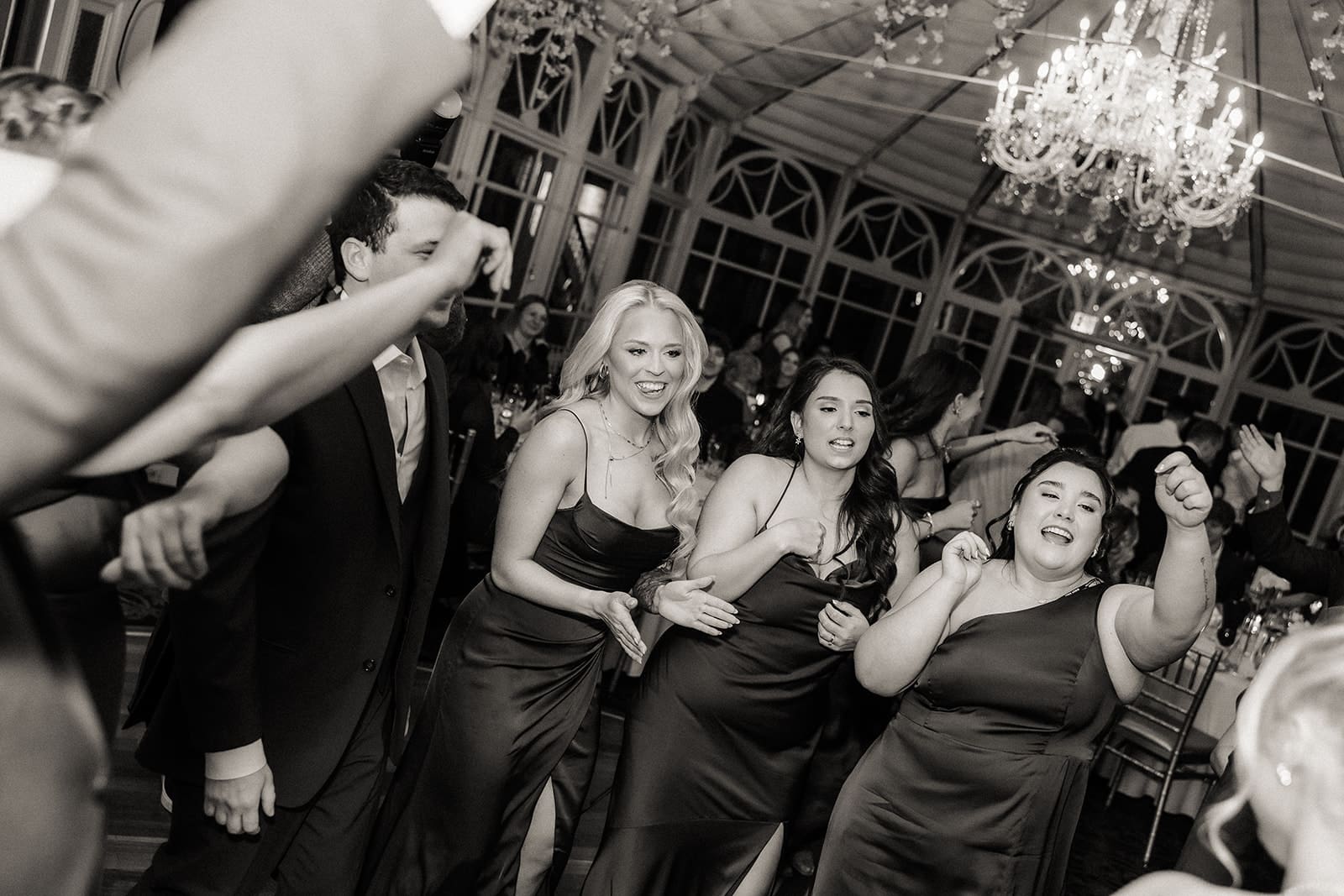 Wedding party dancing during a reception at The Brownstone in Paterson, NJ.