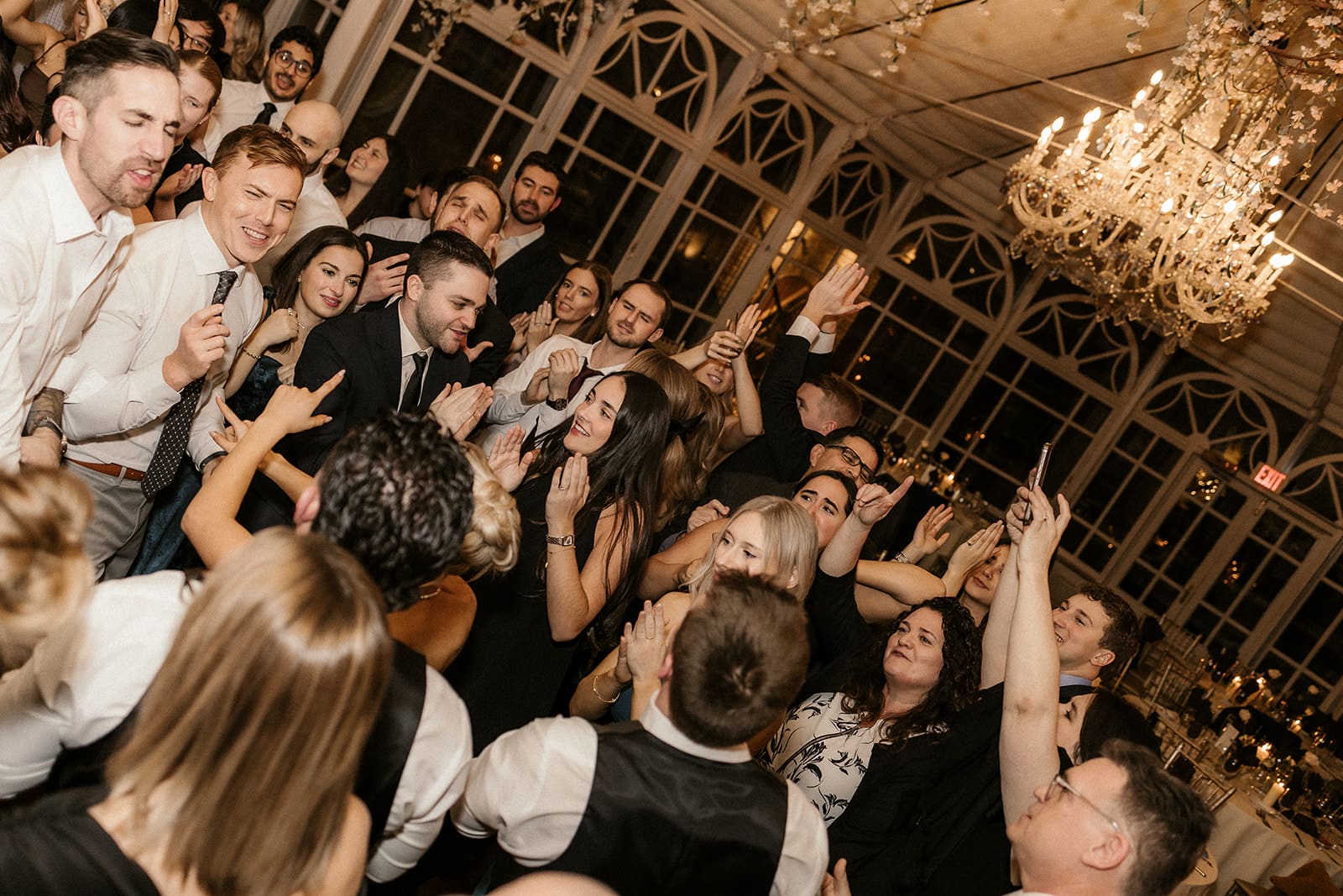 Packed dance floor during a wedding reception at The Brownstone in Paterson, NJ.