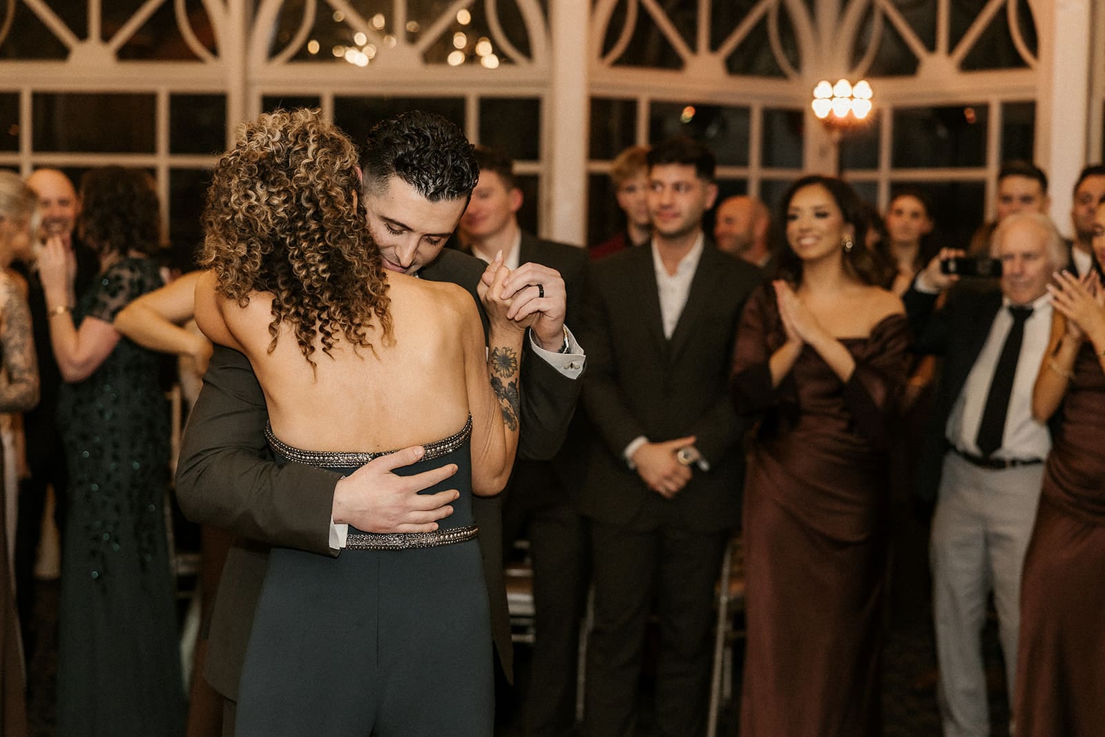 Groom dancing with a family member during his wedding reception at The Brownstone in Paterson, NJ.