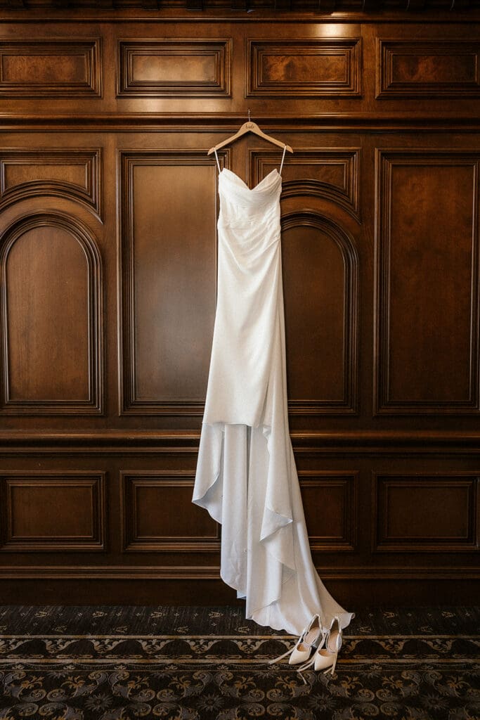 Brides dress hanging on the wall at The Brownstone in Paterson, NJ.