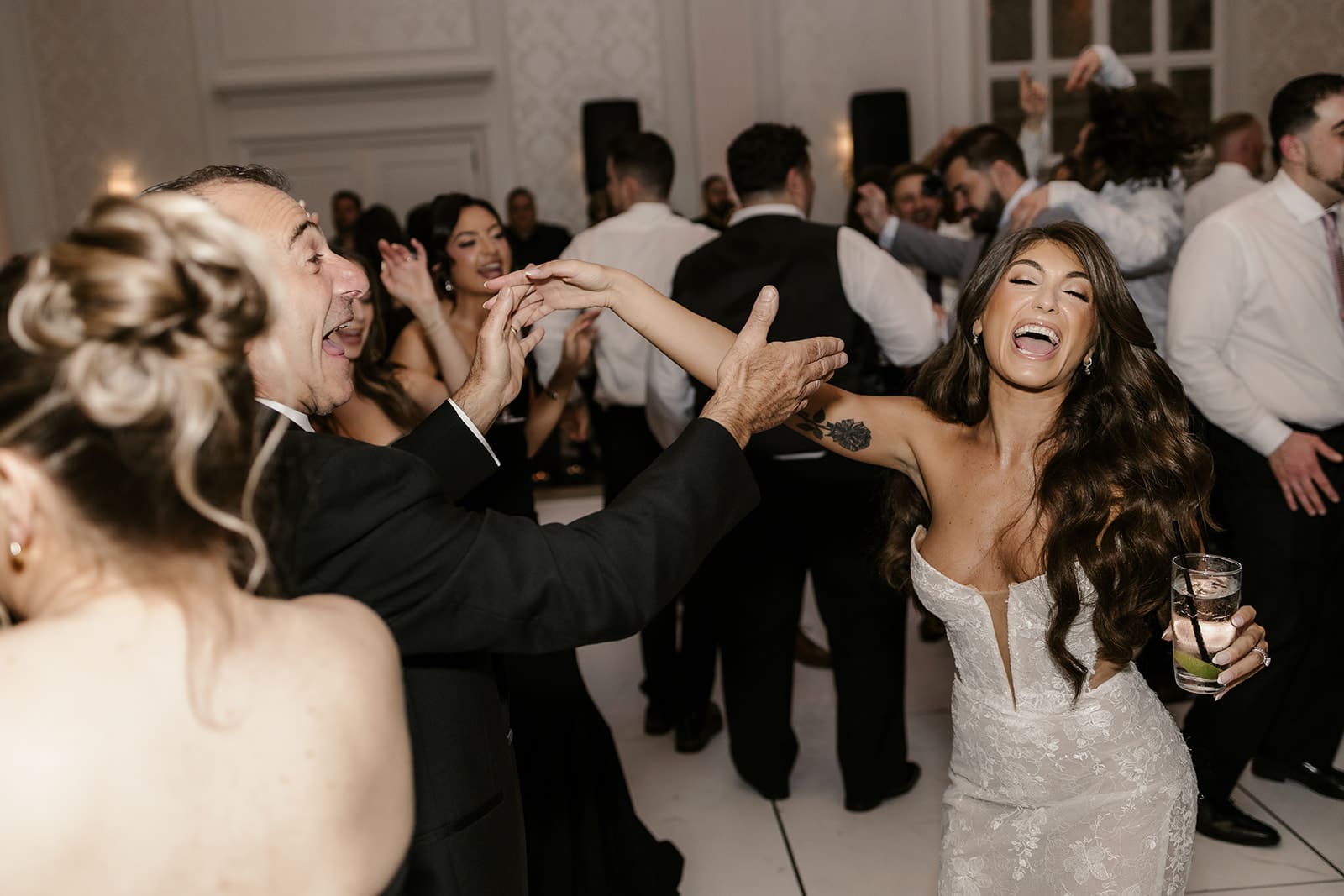 Bride dancing during her wedding reception.