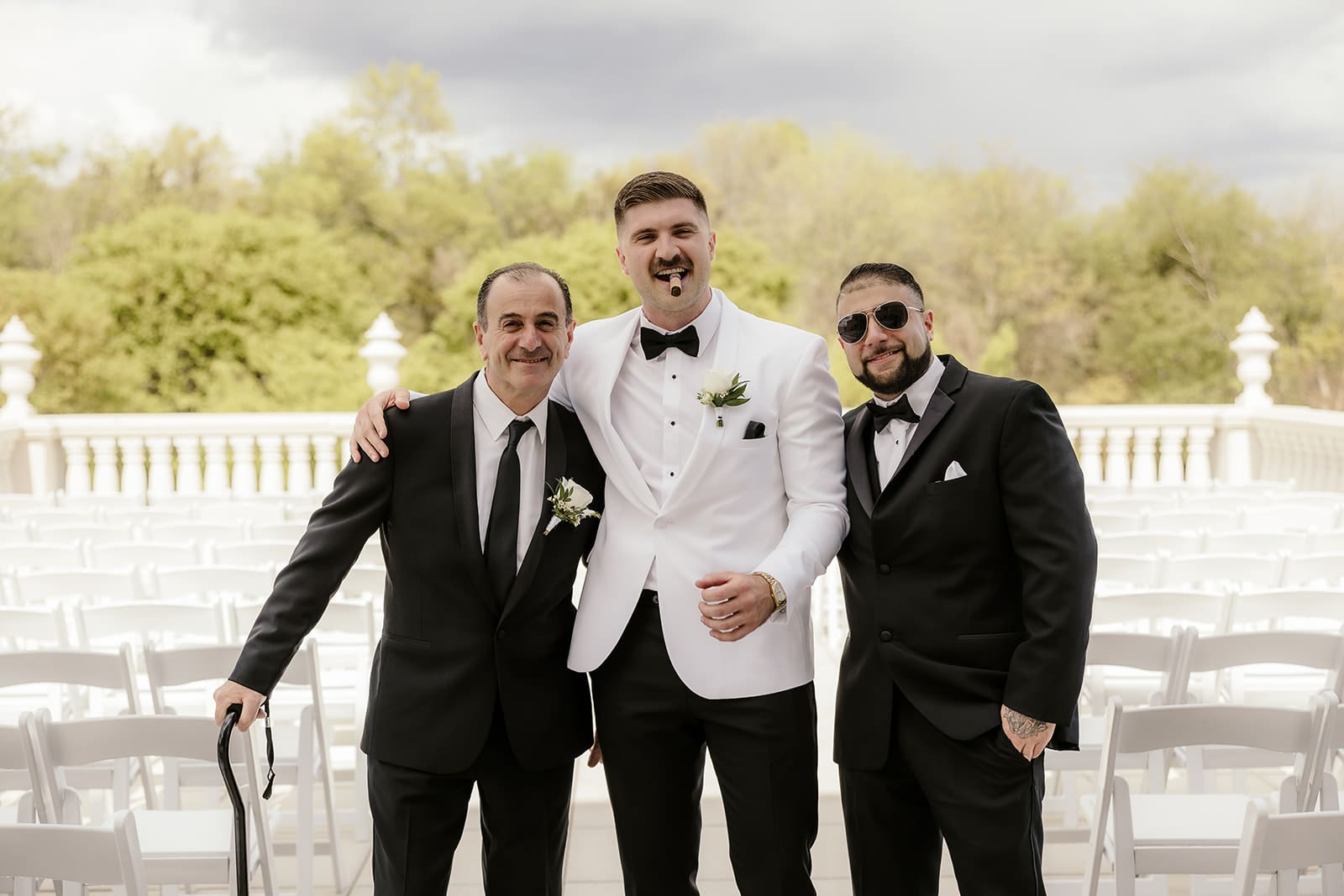 Groom posing with his soon to be father and brother in law.