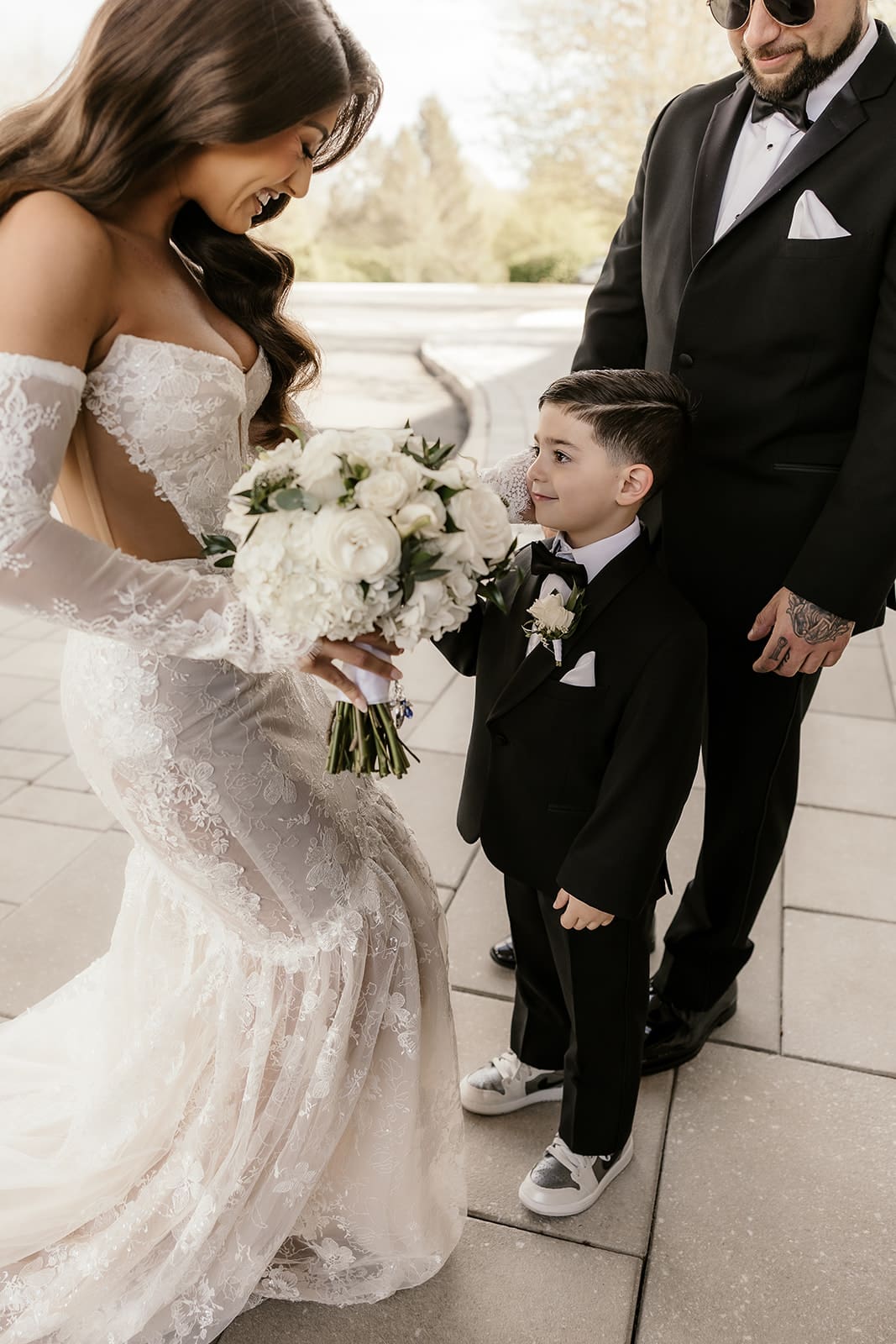 Bride visiting with her nephew before the ceremony.