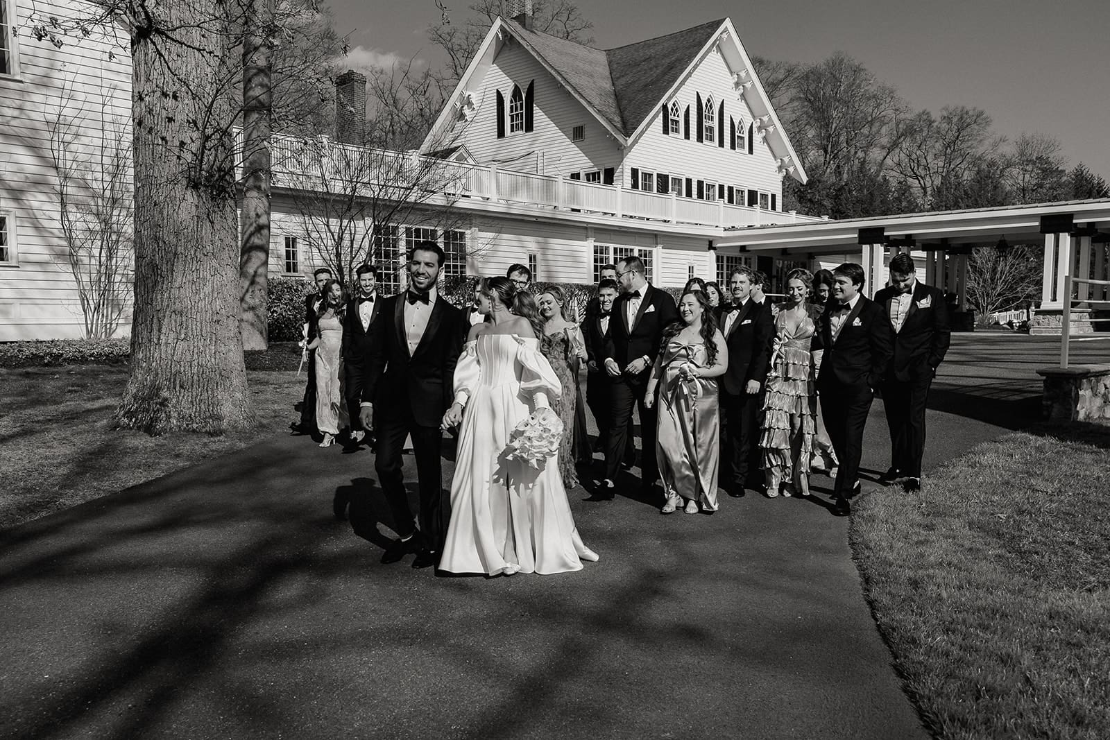 Black and white bridal party portraits outside The Ryland Inn wedding venue in White House Station, NJ.