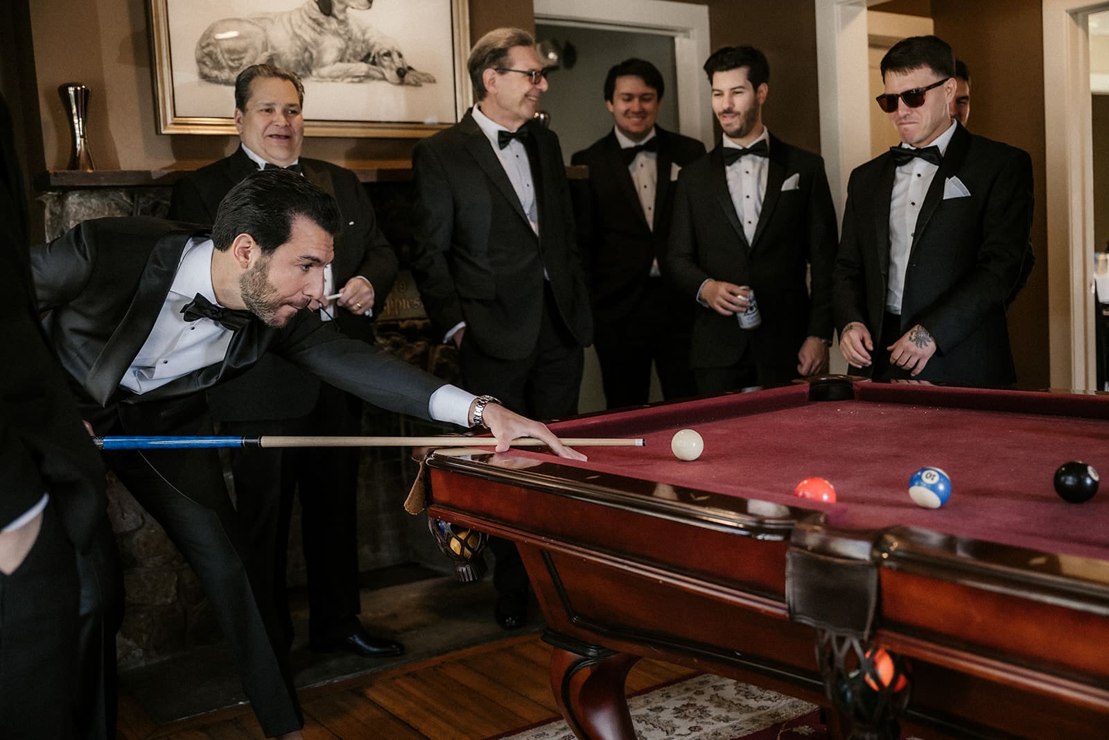 Groom and groomsmen playing pool at The Ryland Inn.