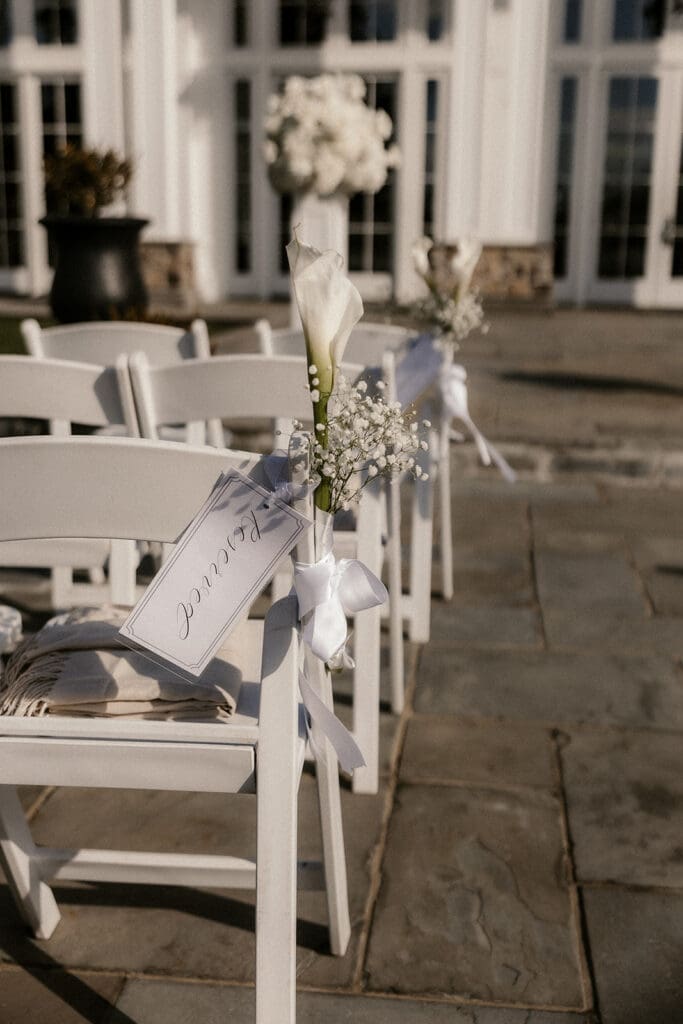 White calla lily aisle decor for a The Ryland Inn wedding ceremony.
