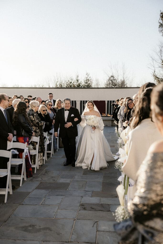 Bride walking down the aisle with her father at The Ryland Inn wedding.