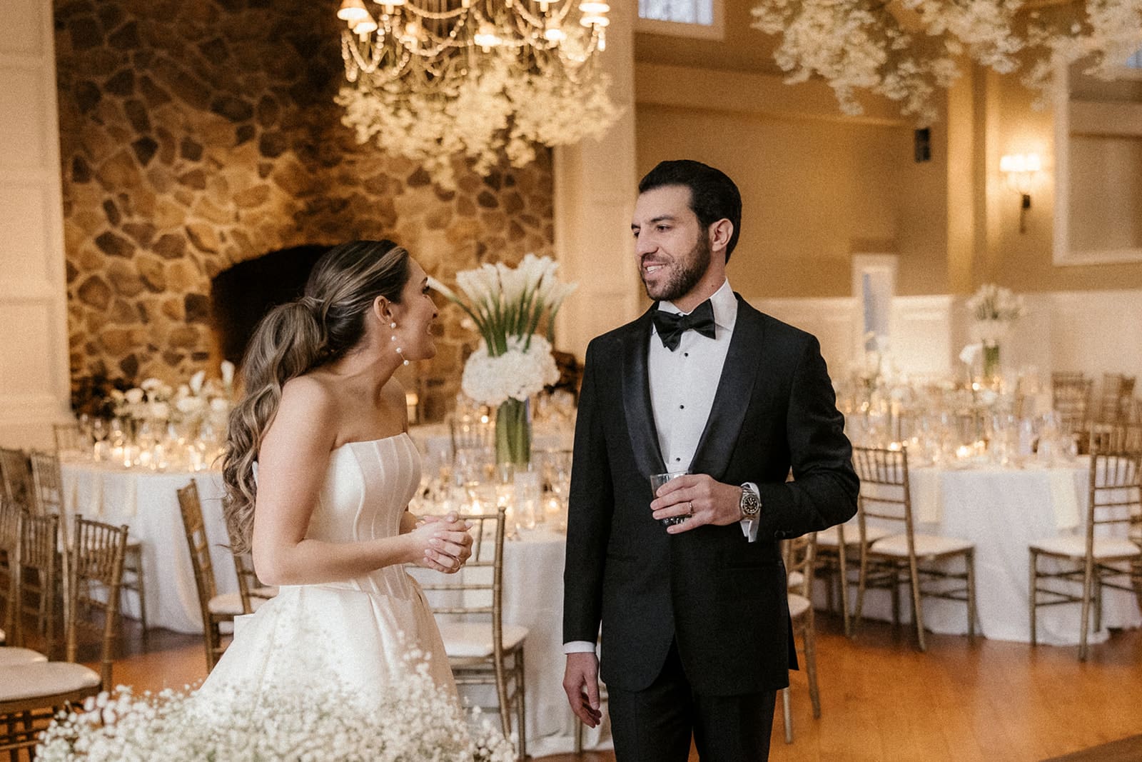 Bride and groom during their wedding reception room preview.