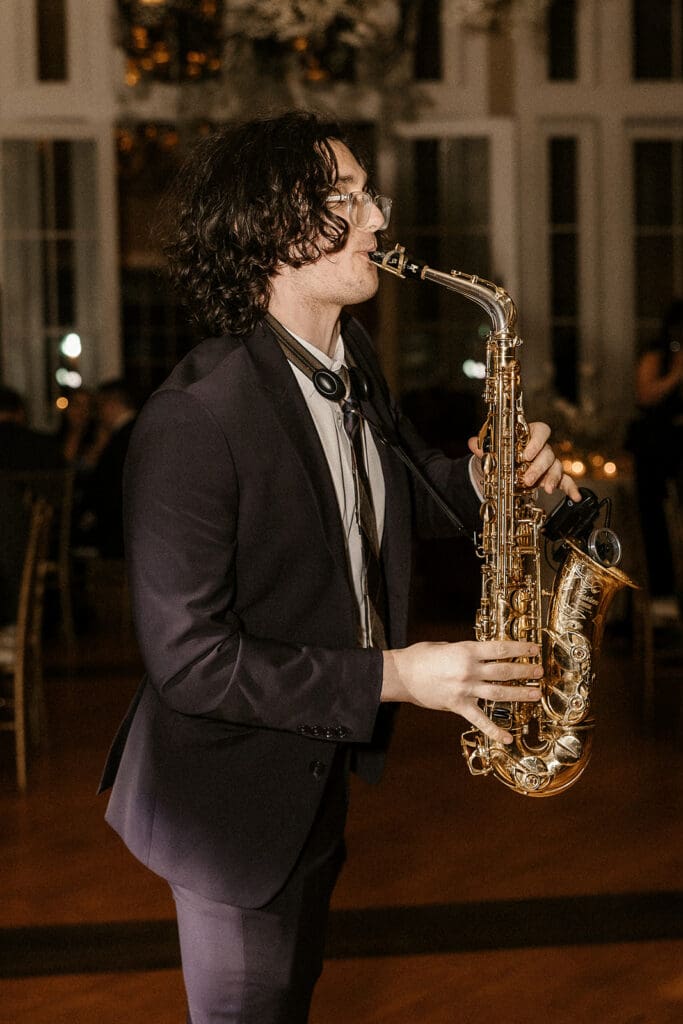 Saxophone player performing during a The Ryland Inn wedding reception.