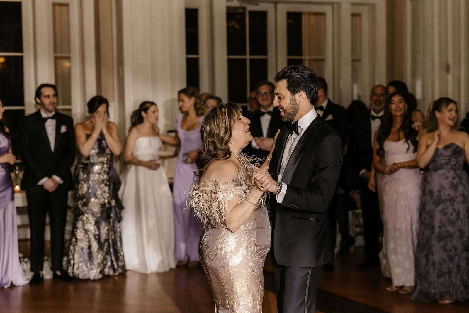 Groom dancing with his mother.