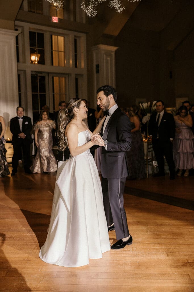 Bride and groom sharing their first dance.