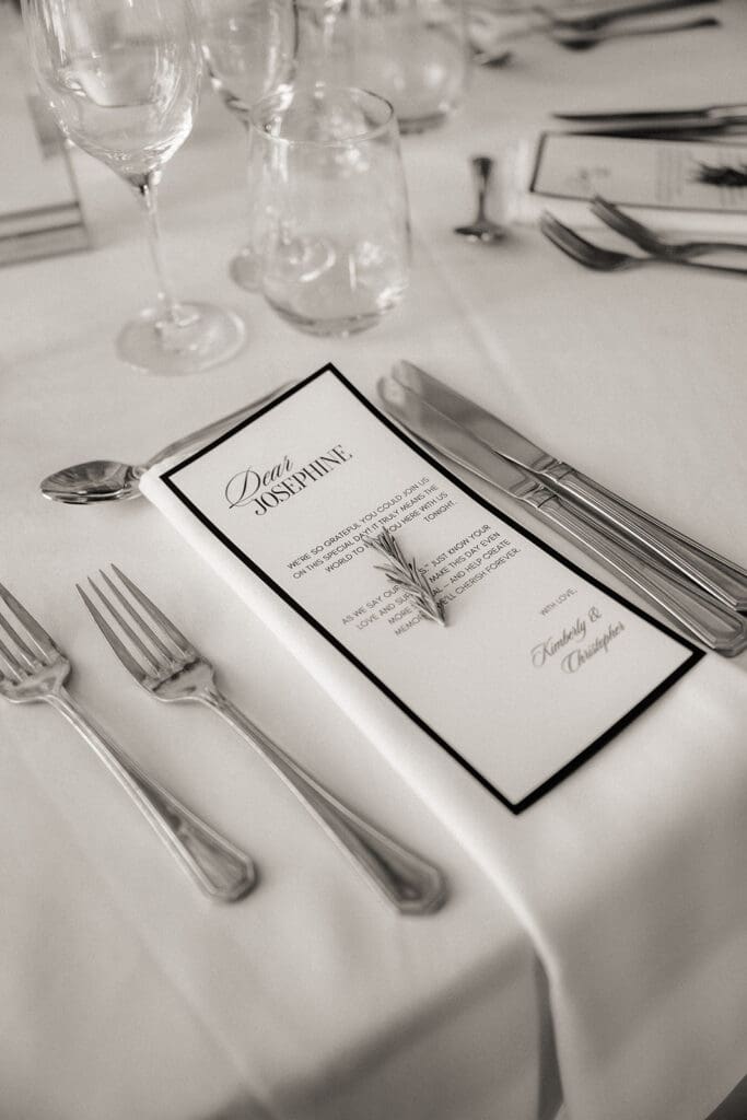 Personal guest note at a table setting during a The Ryland Inn wedding reception.