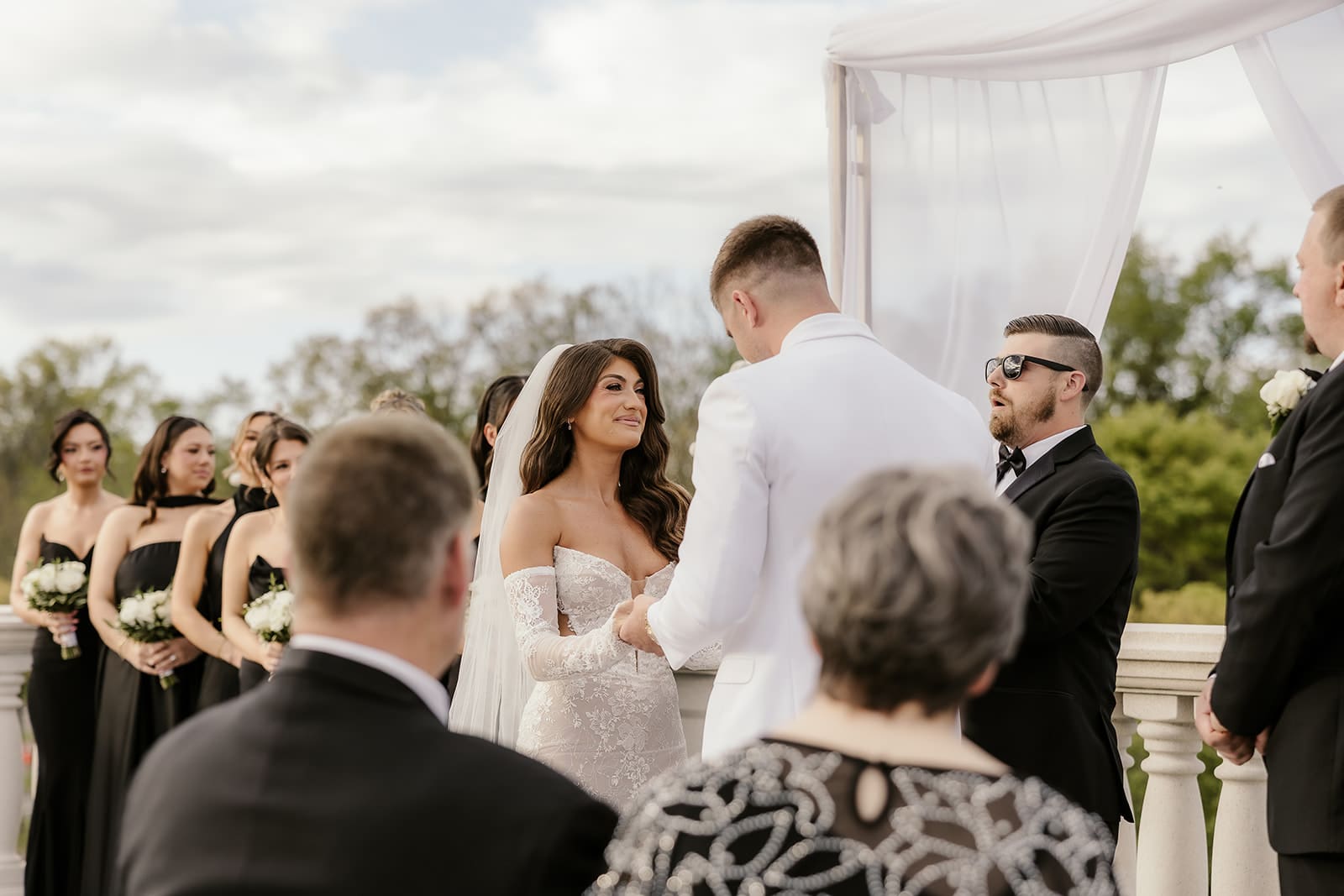 Bride and groom standing at the altar for their Palace at Somerset wedding ceremony.