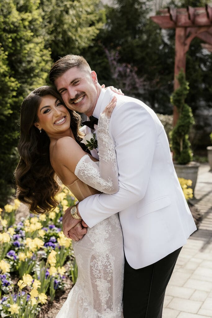Bride and groom posing together at The Palace at Somerset Park.