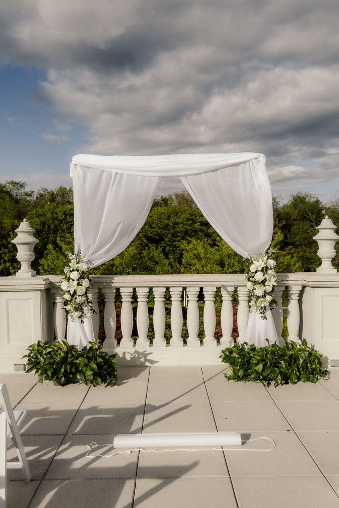 Outdoor ceremony setup on a balcony at The Palace at Somerset.