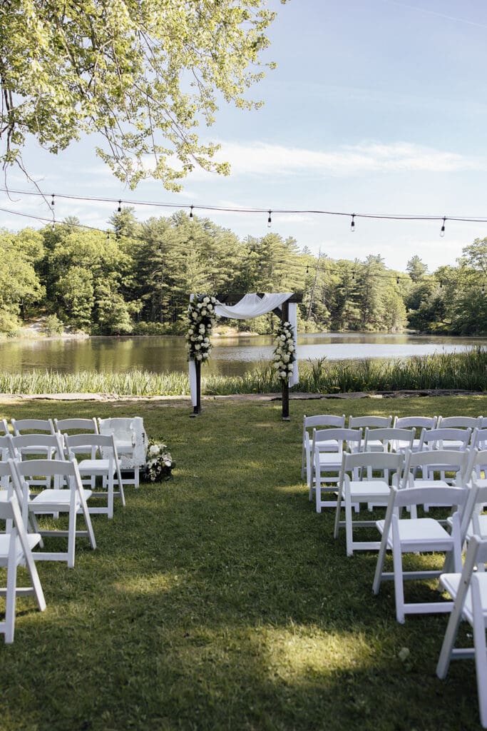 A lake front wedding ceremony at Arrow Park wedding venue in Monroe, NY.