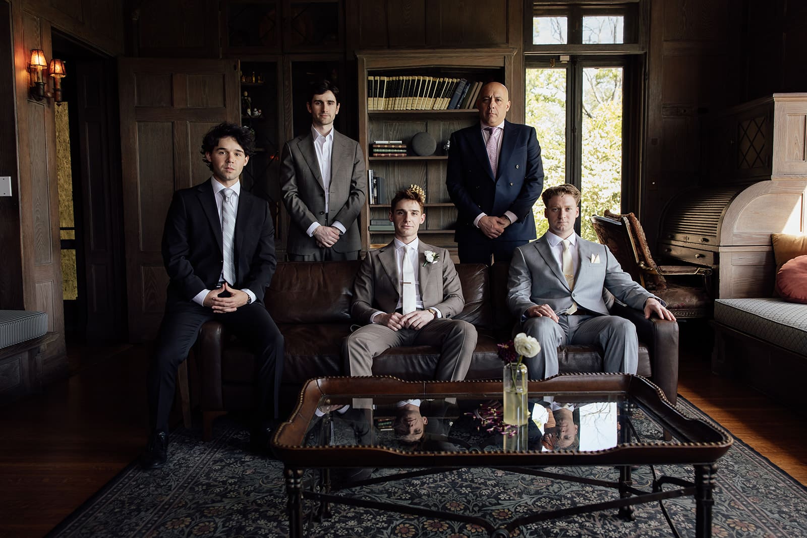 Indoor groom and groomsmen portrait inside The Mansion at Arrow Park wedding venue in Monroe, NY.